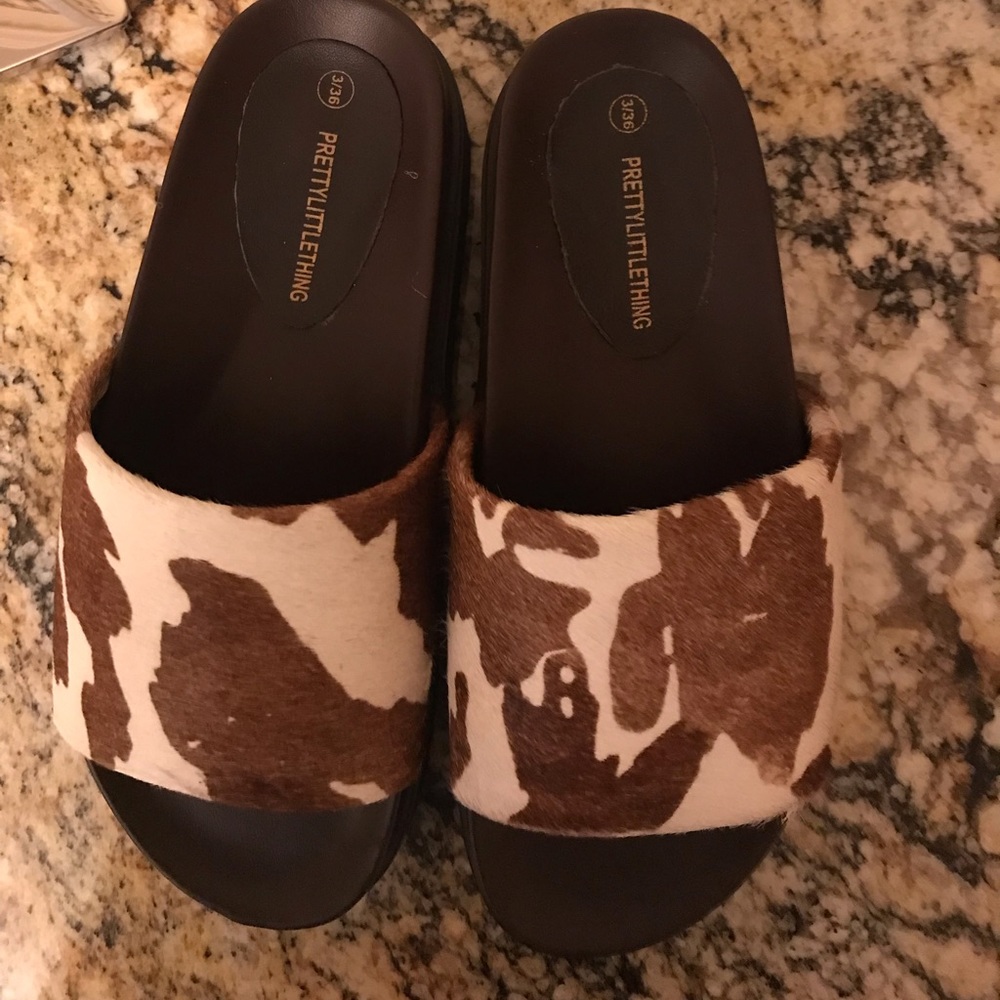 Pretty little thing cow print slides